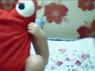 Enticing Korean schoolgirl stripping down to panties on webcam